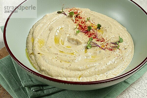 Babaganoush  eggplant appetizer  traditional Lebanese cuisine  homemade  no people  isolate  on a white background