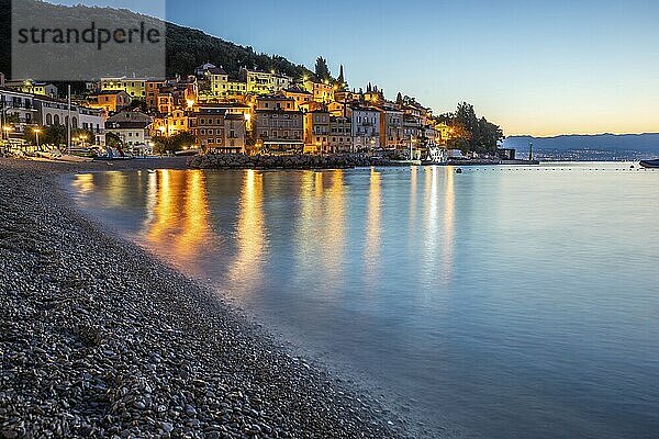 Beautiful historic skyline of a village on the Mediterranean  taken in the morning at sunrise on the beach and by the sea. Dreamlike harbour landscape in Mošcenicka Draga  Moscenicka Draga  Istria  Croatia  Europe