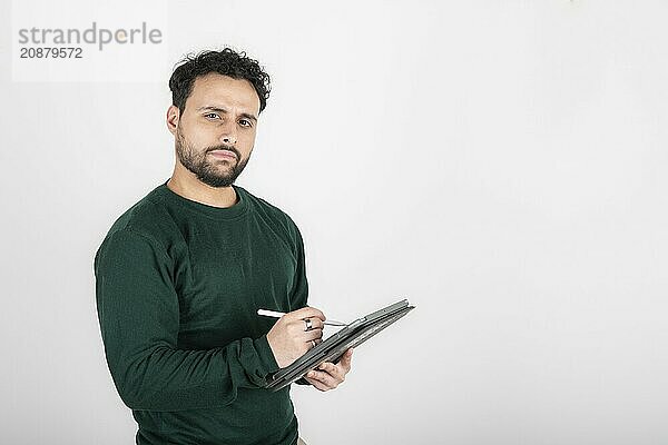 Man using tablet and digital pen. White background