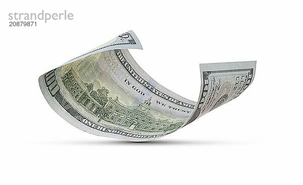 One hundred dollar bill floating down to surface with drop shadow isolated on a white background