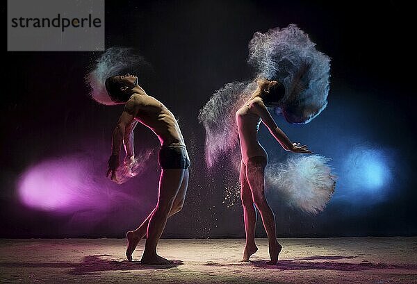 Young man and woman posing emotionally face to face to each other streching slenderly in cloud of pink and blue dust studio shot