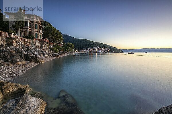 Beautiful historic skyline of a village on the Mediterranean  taken in the morning at sunrise on the beach and by the sea. Dreamlike harbour landscape in Mošcenicka Draga  Moscenicka Draga  Istria  Croatia  Europe