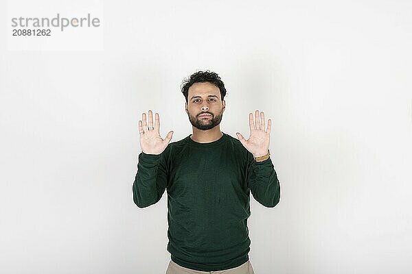 Man showing palm hands. White background