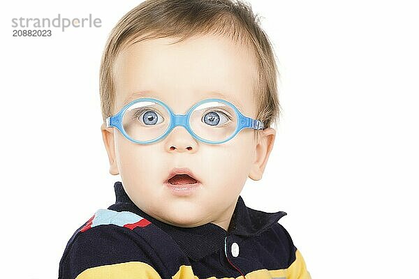 Child with glasses  close-up. Isolated on white