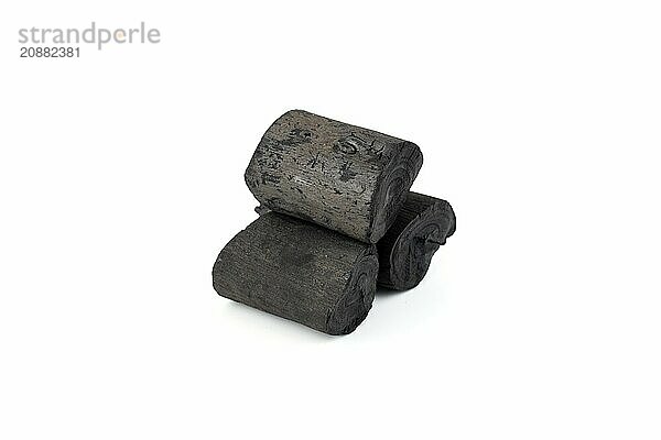 Natural wood charcoal isolated on white background. Pile of coal isolated on white background