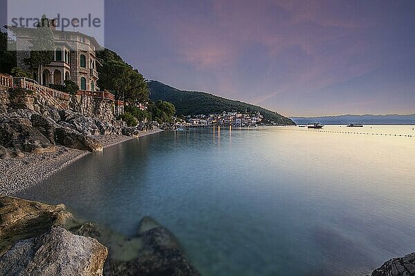 Beautiful historic skyline of a village on the Mediterranean  taken in the morning at sunrise on the beach and by the sea. Dreamlike harbour landscape in Mošcenicka Draga  Moscenicka Draga  Istria  Croatia  Europe