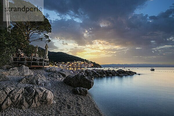 Beautiful historic skyline of a village on the Mediterranean  taken in the morning at sunrise on the beach and by the sea. Dreamlike harbour landscape in Mošcenicka Draga  Moscenicka Draga  Istria  Croatia  Europe