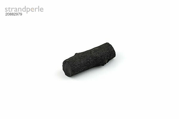 Natural wood charcoal isolated on white background. Pile of coal isolated on white background