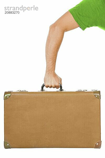 Suitcase in the man's hand on a white background