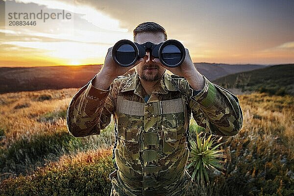 Man in camouflage clothing looks with binoculars over a green landscape at sunset  AI generated  AI generated