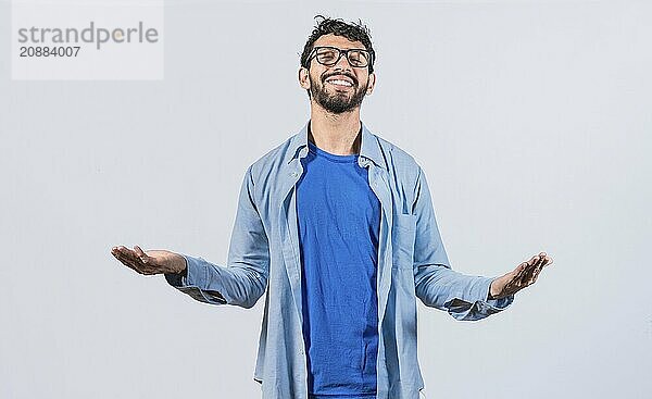 Generous man with open arms isolated. Man sharing open hands looking at the camera with a friendly smile isolated