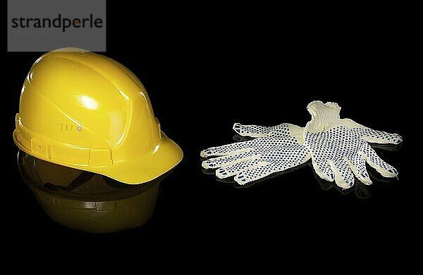 Hard hat and work gloves isolated on white background