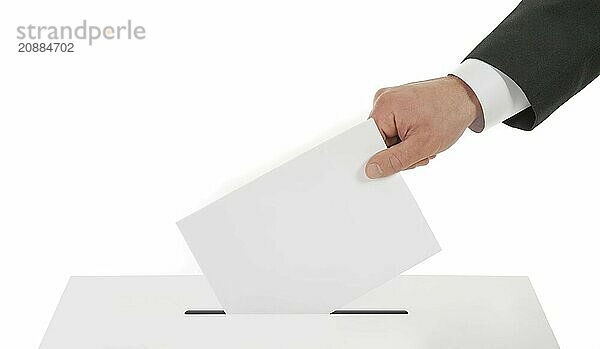 Man's hand down the ballot in the ballot box. Isolated on white