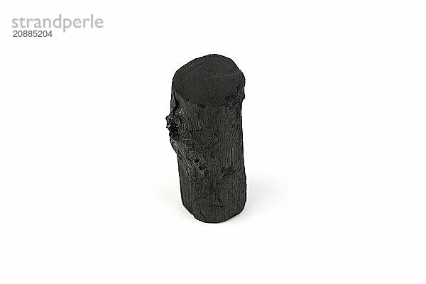 Natural wood charcoal isolated on white background. Pile of coal isolated on white background