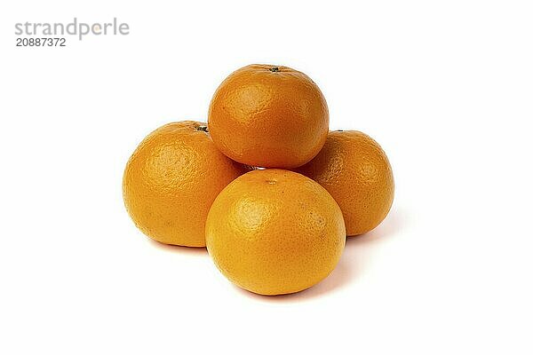 An orange fruit with orange leaves isolated on a white background