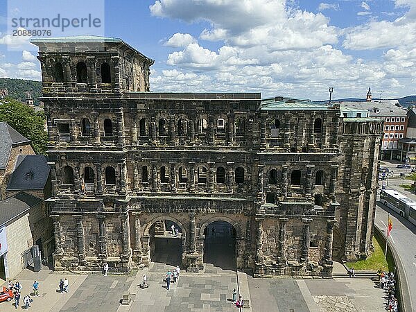 Historical architecture with detailed masonry  Porta Nigra in Germany in sunny summer weather  aerial view  Porta Nigra  Black Gate  Roman city gate  Trier  Rhineland-Palatinate  Germany  Europe