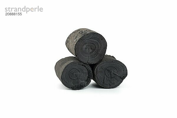 Natural wood charcoal isolated on white background. Pile of coal isolated on white background