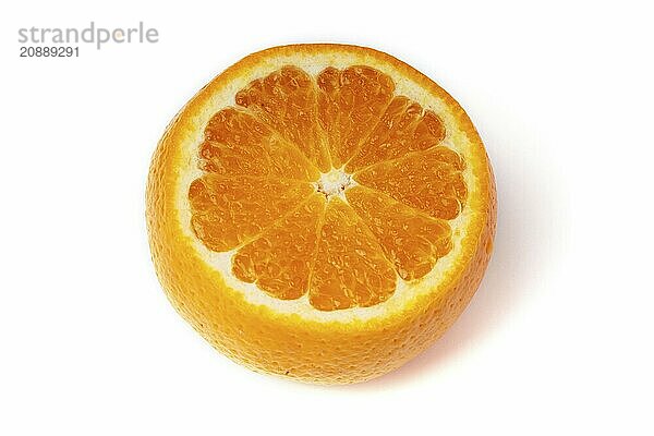 The orange fruit is isolated on a white background with orange slices