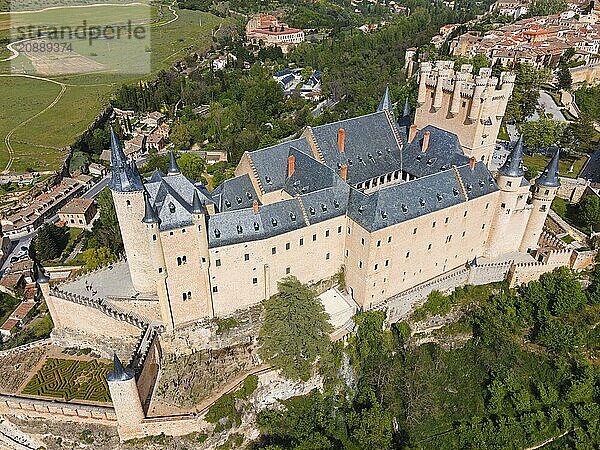 Medieval castle with striking towers  surrounded by landscape and green areas  aerial view  shows impressive fortified structures  aerial view  Alcázar  Alcazar  Segovia  Castile and León  Leon  Spain  Europe