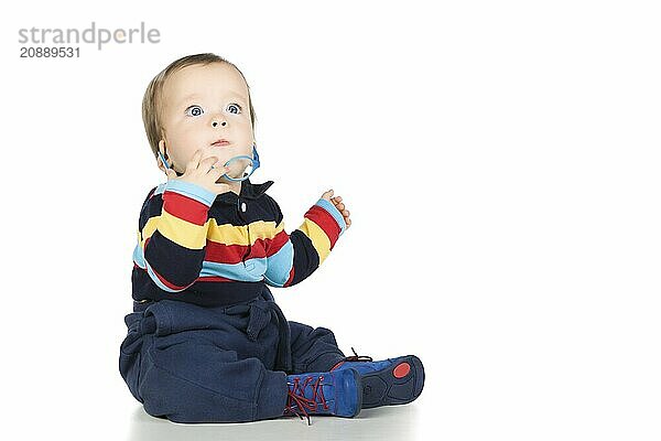 Child with glasses  close-up. Isolated on white