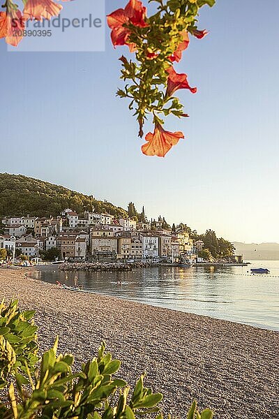 Beautiful historic skyline of a village on the Mediterranean  taken in the morning at sunrise on the beach and by the sea. Dreamlike harbour landscape in Mošcenicka Draga  Moscenicka Draga  Istria  Croatia  Europe