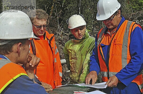 Geologists discuss the oil-bearing formation being explored in a seismic reflectance measurement on the West Coast of New Zealand