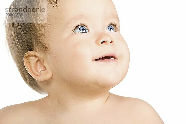 The blue-eyed baby  close-up. Isolated on white