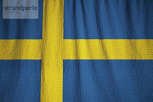 Closeup of Ruffled Sweden Flag  Sweden Flag Blowing in Wind