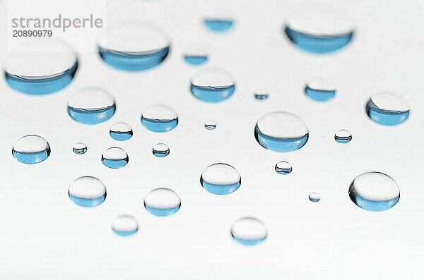 Water droplets on a white background. Macro shot