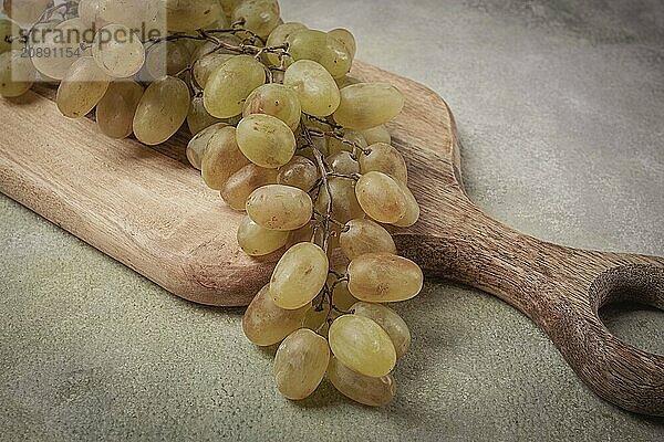 A branch of white grapes  wine grapes  Georgian grape variety Rkatsiteli  top view