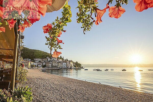 Beautiful historic skyline of a village on the Mediterranean  taken in the morning at sunrise on the beach and by the sea. Dreamlike harbour landscape in Mošcenicka Draga  Moscenicka Draga  Istria  Croatia  Europe