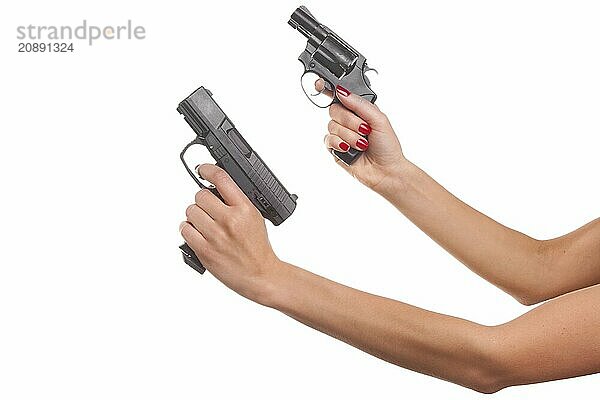 Woman's hand with a gun. Isolated on white