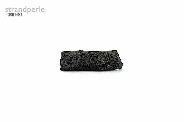 Natural wood charcoal isolated on white background. Pile of coal isolated on white background