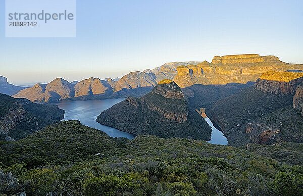 Sunset at Blyde River Canyon with Three Rondawels peak  view of canyon with Blyde River and table mountains in the evening light  canyon landscape  Panorama Route  Mpumalanga  South Africa  Africa