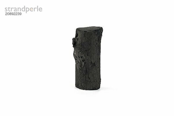 Natural wood charcoal isolated on white background. Pile of coal isolated on white background