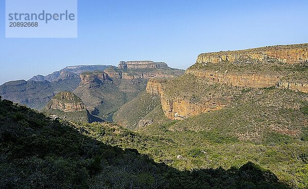 Blyde River Canyon with Three Rondawels peak  view of canyon with Blyde River and Mesa Mountains in the evening light  canyon landscape  Panorama Route  Mpumalanga  South Africa  Africa