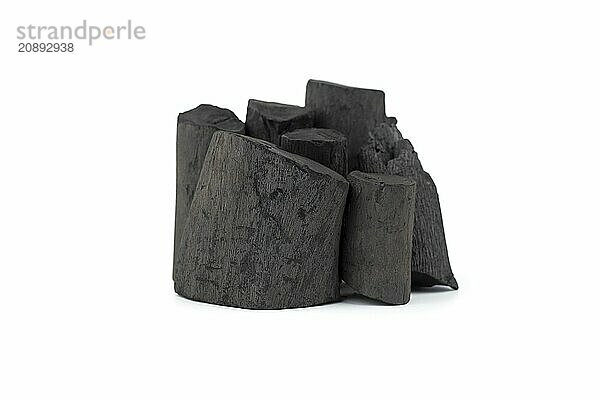 Natural wood charcoal isolated on white background. Pile of coal isolated on white background