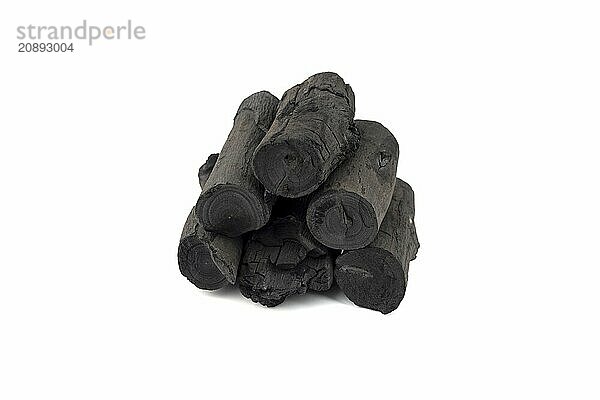 Natural wood charcoal isolated on white background. Pile of coal isolated on white background