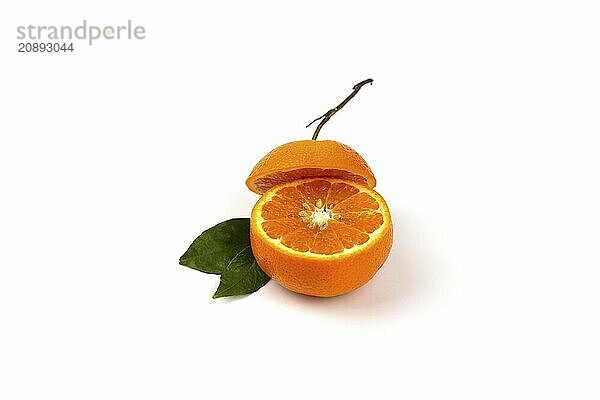 An orange fruit  orange slices  and orange leaves are isolated on a white background