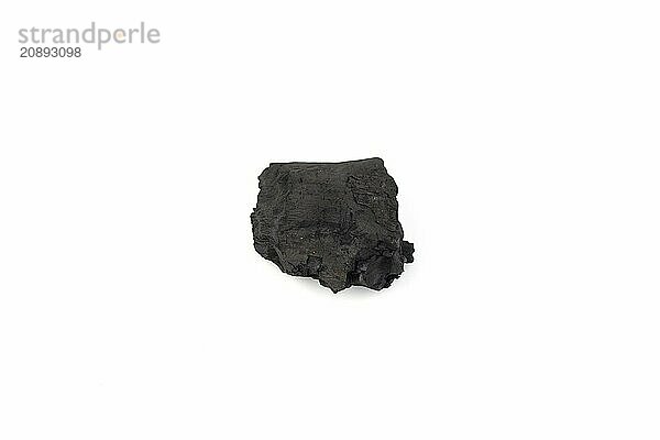 Natural wood charcoal isolated on white background. Pile of coal isolated on white background