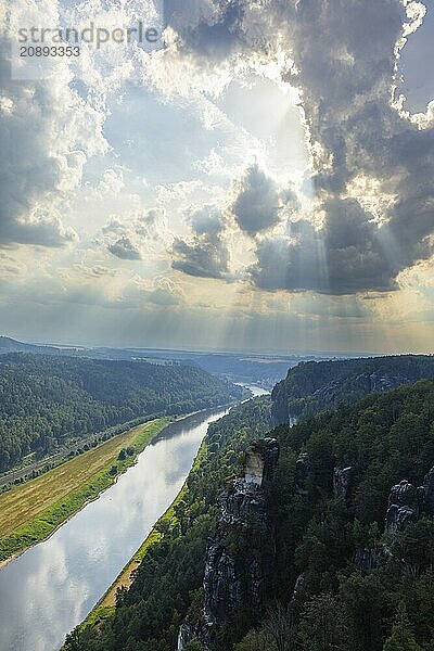 The Bastei is a rock formation with a viewing platform in Saxon Switzerland on the right bank of the River Elbe in the municipality of Lohmen between the spa town of Rathen and the town of Wehlen. It is one of the most visited tourist attractions in Saxon Switzerland. Dramatic sky over the Bastei  Saxon Switzerland  Rathen  Saxony  Germany  Europe