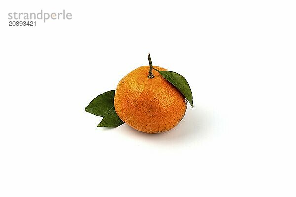 An orange fruit with orange leaves isolated on a white background