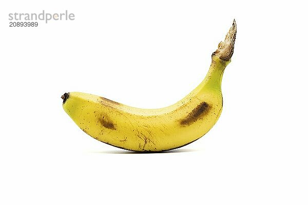 Single banana isolated on white background