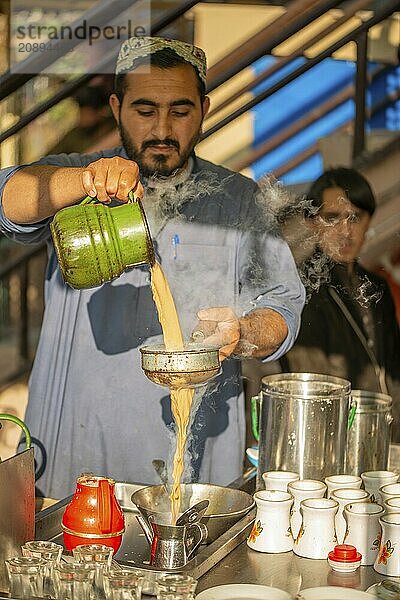 Islamabad  Islamabad Capital Territory  Pakistan  February 5  2020  A man making a tea at tea stall in a winter morning  Asia