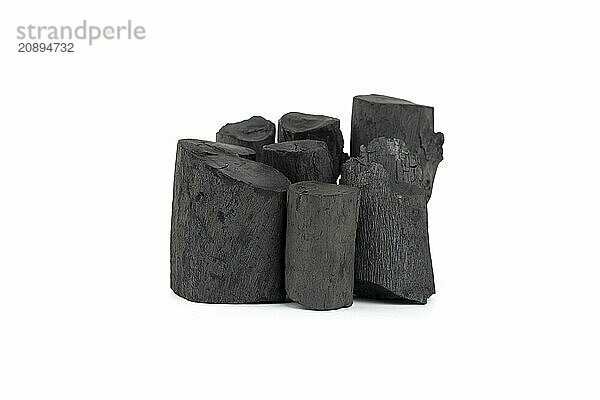 Natural wood charcoal isolated on white background. Pile of coal isolated on white background