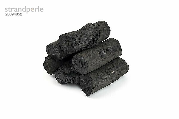 Natural wood charcoal isolated on white background. Pile of coal isolated on white background