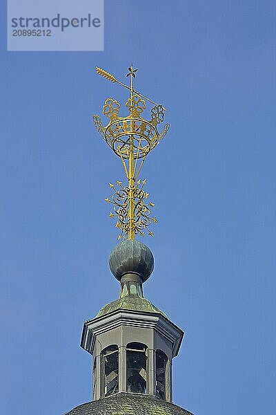 Landmark golden crown on the spire of the Nikolaikirche  golden  crown  detail  cut-out  handicraft  forging  arrow  weather vane  Siegen  Siegerland  North Rhine-Westphalia  Germany  Europe