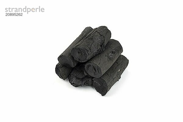 Natural wood charcoal isolated on white background. Pile of coal isolated on white background