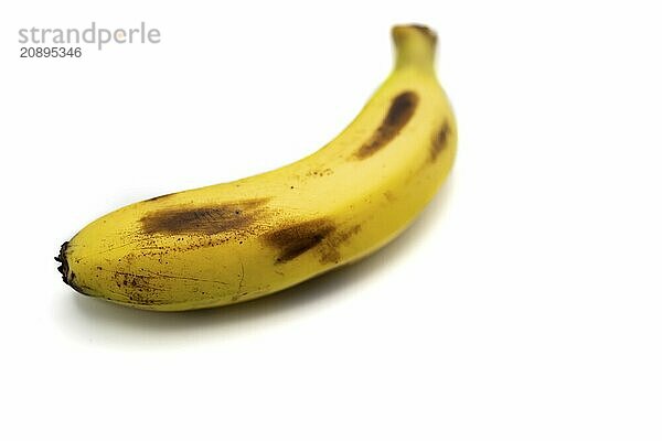 Single banana isolated on white background