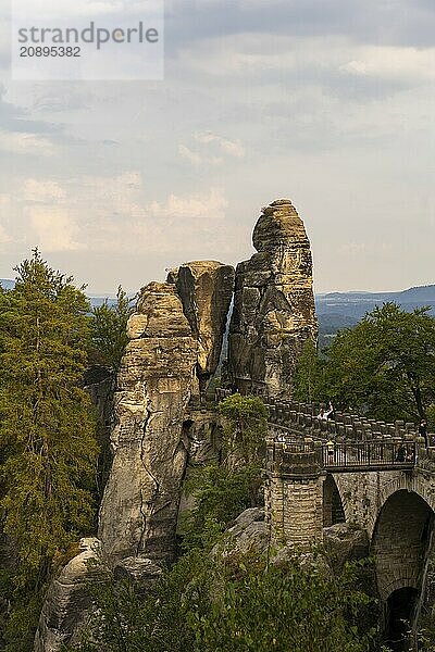 The Bastei is a rock formation with a viewing platform in Saxon Switzerland on the right bank of the River Elbe in the municipality of Lohmen between the spa town of Rathen and the town of Wehlen. It is one of the most visited tourist attractions in Saxon Switzerland. Bastei Bridge  Saxon Switzerland  Rathen  Saxony  Germany  Europe